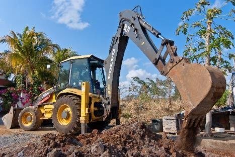 TEP backhoe loader carrying out excavation works